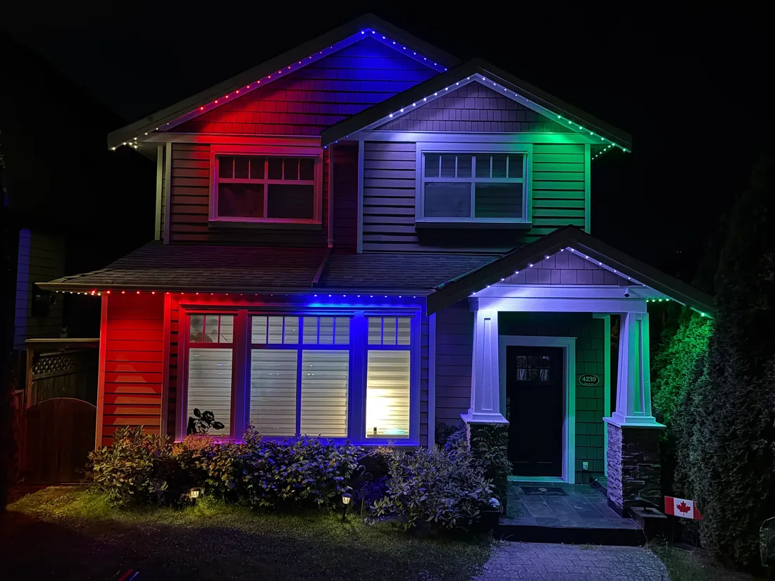 Vancouver craftsman home with multicolor zone permanent LED roofline lighting installed by Vancouver Glow
