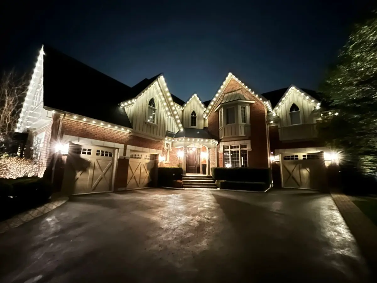 Vancouver home with warm white permanent outdoor LED lights along roofline