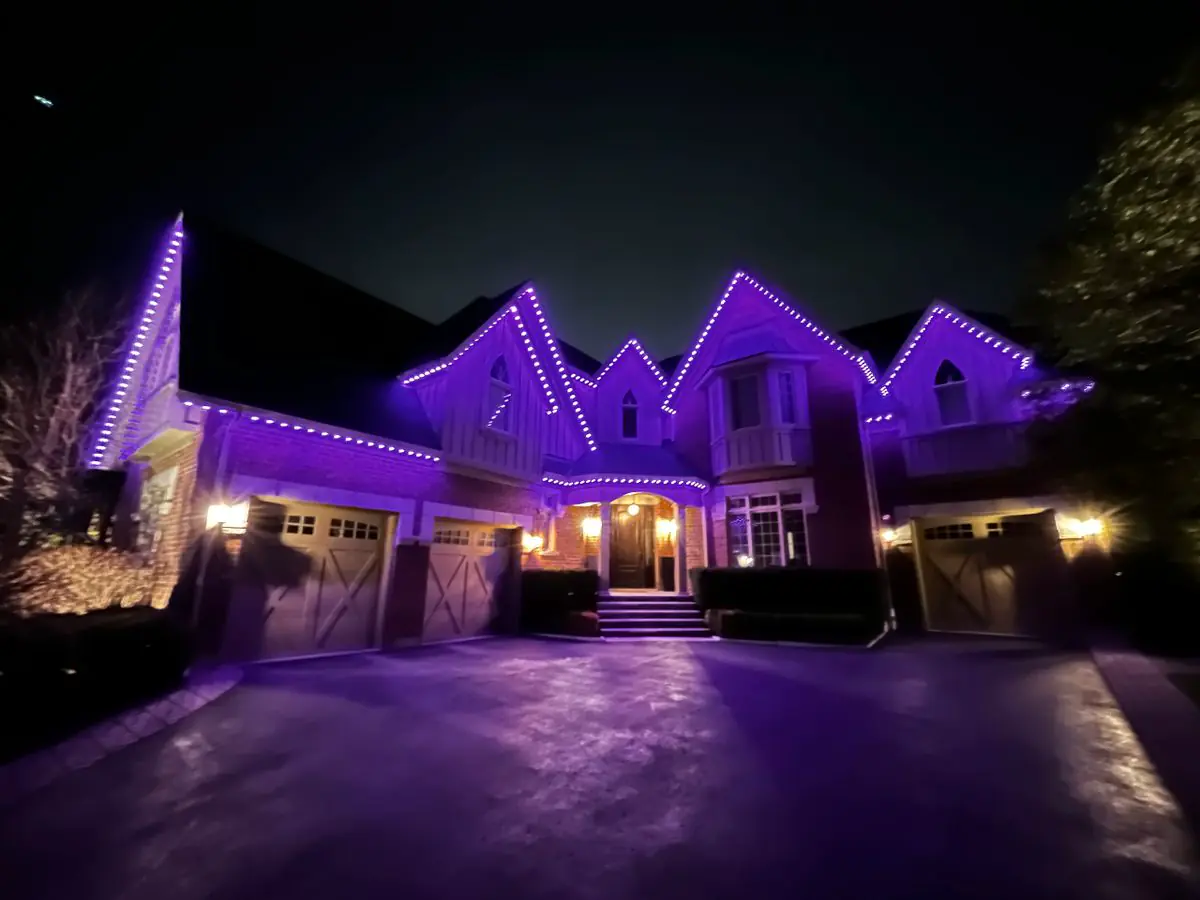 Vancouver home with purple Wi-Fi-enabled outdoor LED lights at night